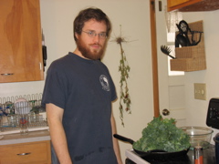 Chris and his giant beard cooking greens
